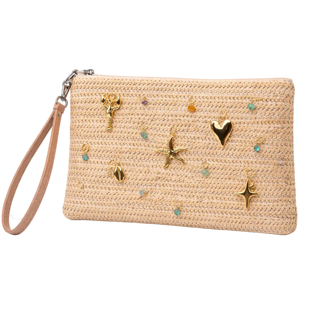 Beige straw clutch with decorative elements on a white background