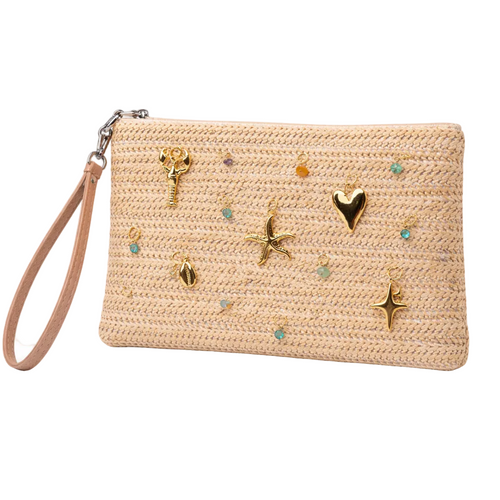 Beige straw clutch with decorative elements on a white background