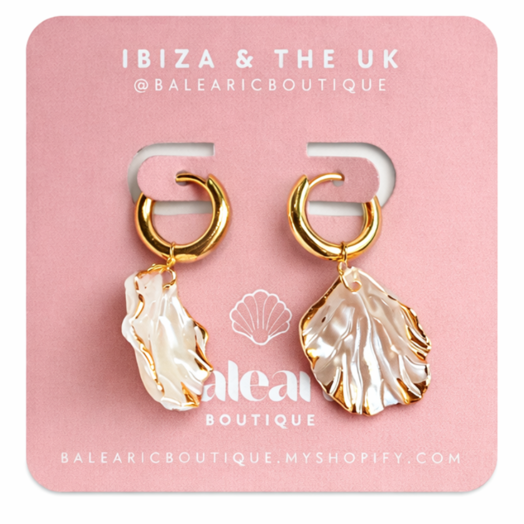Shell-shaped earrings on a pink card with 'Ibiza & The UK' branding.